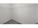 Neat walk-in closet featuring corner shelving to keep items organized and accessible at 5521 Colfax Ter, Port Charlotte, FL 33981