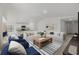 Bright and airy living room featuring modern furniture, an open layout, and stylish decor at 5521 Colfax Ter, Port Charlotte, FL 33981