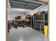 Spacious two car garage with storage and motor bikes at 5531 Cannes Cir # 201, Sarasota, FL 34231