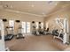 Well-equipped gym with treadmills, elliptical machines, and weight-training equipment at 5531 Cannes Cir # 201, Sarasota, FL 34231