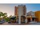 Charming theater exterior with vintage signage and a welcoming entrance at dusk at 5531 Cannes Cir # 201, Sarasota, FL 34231