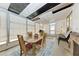 Bright dining area with a fireplace, ceiling fan and lots of natural light at 5619 Bayshore Rd # 164, Palmetto, FL 34221