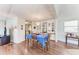 Charming dining room with built-in display cabinets, a chandelier, and a table set for dinner at 5619 Bayshore Rd # 164, Palmetto, FL 34221