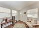 Cozy entryway with hardwood floors, natural light, and comfortable seating area at 5619 Bayshore Rd # 164, Palmetto, FL 34221