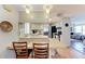 Open kitchen view with breakfast bar and modern appliances, connecting seamlessly to other living spaces at 5619 Bayshore Rd # 164, Palmetto, FL 34221
