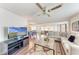 Spacious open-concept living area with hardwood floors, modern decor, and ample seating at 5619 Bayshore Rd # 164, Palmetto, FL 34221