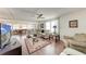 Bright living room with a large sectional sofa, decorative rug, and plenty of natural light at 5619 Bayshore Rd # 164, Palmetto, FL 34221