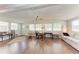 Bright living room with hardwood floors, multiple windows, and comfortable seating at 5619 Bayshore Rd # 164, Palmetto, FL 34221