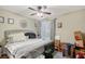Cozy bedroom featuring a comfortable bed and soft natural lighting at 5681 Bidwell Pkwy # 102, Sarasota, FL 34233