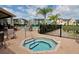 Relax in the community's hot tub, perfect for unwinding after a long day at 5681 Bidwell Pkwy # 102, Sarasota, FL 34233