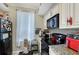Efficient kitchen featuring granite countertops and modern appliances at 5681 Bidwell Pkwy # 102, Sarasota, FL 34233