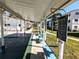 Community shuffleboard courts with benches and a scoreboard at 5895 17Th W St # B-26, Bradenton, FL 34207