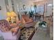 A well-lit living room with dining room view and decorative mirrors at 5895 17Th W St # B-26, Bradenton, FL 34207