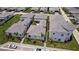 Overhead view of elegant homes with private pools, meticulously landscaped yards, and modern design at 5910 Red Mangrove Ln, Bradenton, FL 34210