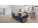 Open living space connecting to a modern kitchen and outdoor patio area at 5910 Red Mangrove Ln, Bradenton, FL 34210