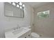 Modern bathroom featuring sleek vanity, new fixtures, and tiled walk-in shower at 5924 Gulf Of Mexico Dr, Longboat Key, FL 34228