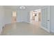 Bright bedroom featuring double doors to bathroom and kitchen at 5924 Gulf Of Mexico Dr, Longboat Key, FL 34228