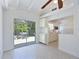 Bright kitchen featuring white cabinets and stainless microwave at 5924 Gulf Of Mexico Dr, Longboat Key, FL 34228