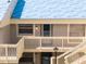 Two-story townhouse showcasing dual entryways and a well-maintained facade at 5964 7Th W Ave # 5964, Bradenton, FL 34209