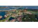 Aerial view of community highlighting waterways, golf course, and nearby bridges at 6151 Bahia Del Mar Blvd # 123, St Petersburg, FL 33715