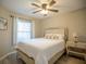 Inviting bedroom featuring a comfortable queen bed and ample natural light at 6151 Bahia Del Mar Blvd # 123, St Petersburg, FL 33715