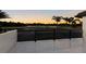 Enjoy a stunning view of the golf course and pond from the spacious tiled balcony with black railing at 6919 Westchester Cir, Lakewood Ranch, FL 34202