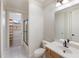Bright bathroom featuring a walk-in shower, toilet, and vanity with sink at 6919 Westchester Cir, Lakewood Ranch, FL 34202