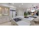 Gourmet kitchen showcasing a gas range, bright cabinetry, and center island at 6919 Westchester Cir, Lakewood Ranch, FL 34202