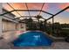 Private screened-in pool and spa with golf course view at 6919 Westchester Cir, Lakewood Ranch, FL 34202