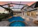 Private backyard boasts a pool, jacuzzi, and screened enclosure at 6919 Westchester Cir, Lakewood Ranch, FL 34202