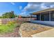 Landscaped backyard with patio and a wooden fence surrounding the property at 7719 9Th Avenue Nw Dr, Bradenton, FL 34209
