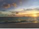 Beach view with setting sun and golden skies at 7719 9Th Avenue Nw Dr, Bradenton, FL 34209