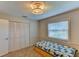 Bedroom with closet, window and platform bed with drawers at 7719 9Th Avenue Nw Dr, Bradenton, FL 34209