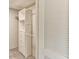 Walk-in closet featuring white shelving and drawers for optimal storage at 7719 9Th Avenue Nw Dr, Bradenton, FL 34209