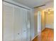 Hallway with closet and hardwood flooring at 7719 9Th Avenue Nw Dr, Bradenton, FL 34209