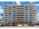 Exterior shot of a riverfront condo building with direct parking access at 1400 1St W Ave # 203, Bradenton, FL 34205