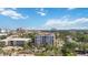 Condo building featuring multiple balconies and well-maintained landscaping at 1400 1St W Ave # 203, Bradenton, FL 34205