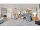 Bright and airy living room featuring a comfortable seating arrangement and ample natural light at 1400 1St W Ave # 203, Bradenton, FL 34205