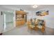 Living space flows into the kitchen and dining area, featuring a bright and airy design at 1400 1St W Ave # 203, Bradenton, FL 34205