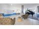 Inviting lobby area with plush seating, stylish decor, and abundant natural light at 1400 1St W Ave # 203, Bradenton, FL 34205