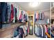 Spacious walk-in closet featuring ample wire shelving and a built-in water heater for efficient space utilization at 1400 1St W Ave # 203, Bradenton, FL 34205