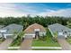 Aerial view of single-Gathering homes with manicured lawns in a desirable neighborhood at 15605 Derna Ter, Bradenton, FL 34211