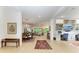 Open living space showcasing the dining room, living room, and home office at 15605 Derna Ter, Bradenton, FL 34211