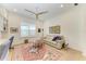 Sitting room offering natural light, a ceiling fan, a decorative rug, and comfortable seating at 15605 Derna Ter, Bradenton, FL 34211