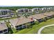 Scenic aerial view of the community with lush landscaping and convenient parking at 18113 Gawthrop Drive # 101, Lakewood Ranch, FL 34211