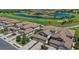Scenic aerial view of the neighborhood and golf course with lush landscaping at 18113 Gawthrop Drive # 101, Lakewood Ranch, FL 34211