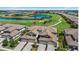 Scenic aerial view of the neighborhood and golf course with lush landscaping at 18113 Gawthrop Drive # 101, Lakewood Ranch, FL 34211