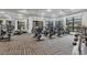 Spacious gym with state-of-the-art fitness equipment, large windows offering natural light and beautiful views at 18113 Gawthrop Drive # 101, Lakewood Ranch, FL 34211