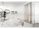 Bright bathroom featuring a modern soaking tub, decorative tile floor, and modern vanity with stylish mirror at 18215 Cayo Largo Pl, Bradenton, FL 34202