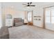 Bedroom featuring soft carpet, neutral plaid wall, and arched built-in for a serene retreat at 18215 Cayo Largo Pl, Bradenton, FL 34202